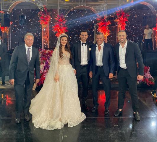محمد سراج الدين وخالد مرتجي مع العروسين