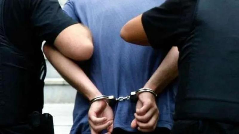 ضبط متهم تعدى على جاره وأطفاله بالأسلحة البيضاء والكلاب - صورة أرشيفية